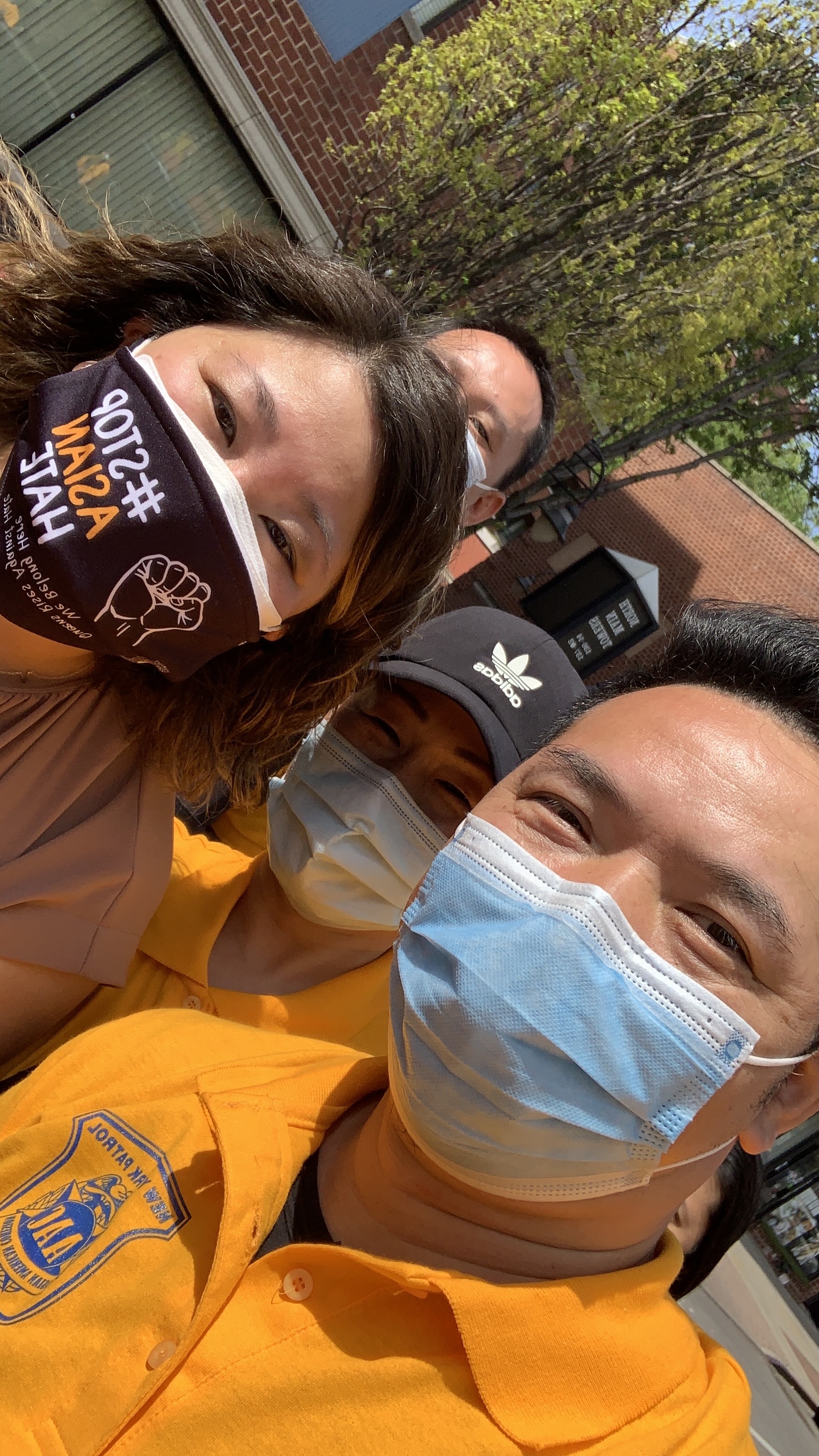 Liu Qiming and another participant at the gathering, both wearing masks.