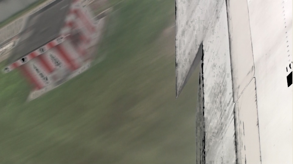 Qiming Liu, Fly, 2009: film still 5, with the landing sequence transformed into blurred diagonal bands.