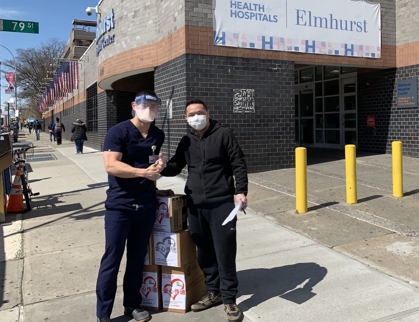 Photograph from the original interview: March 24: With doctors after delivering protective supplies to Elmhurst Hospital.