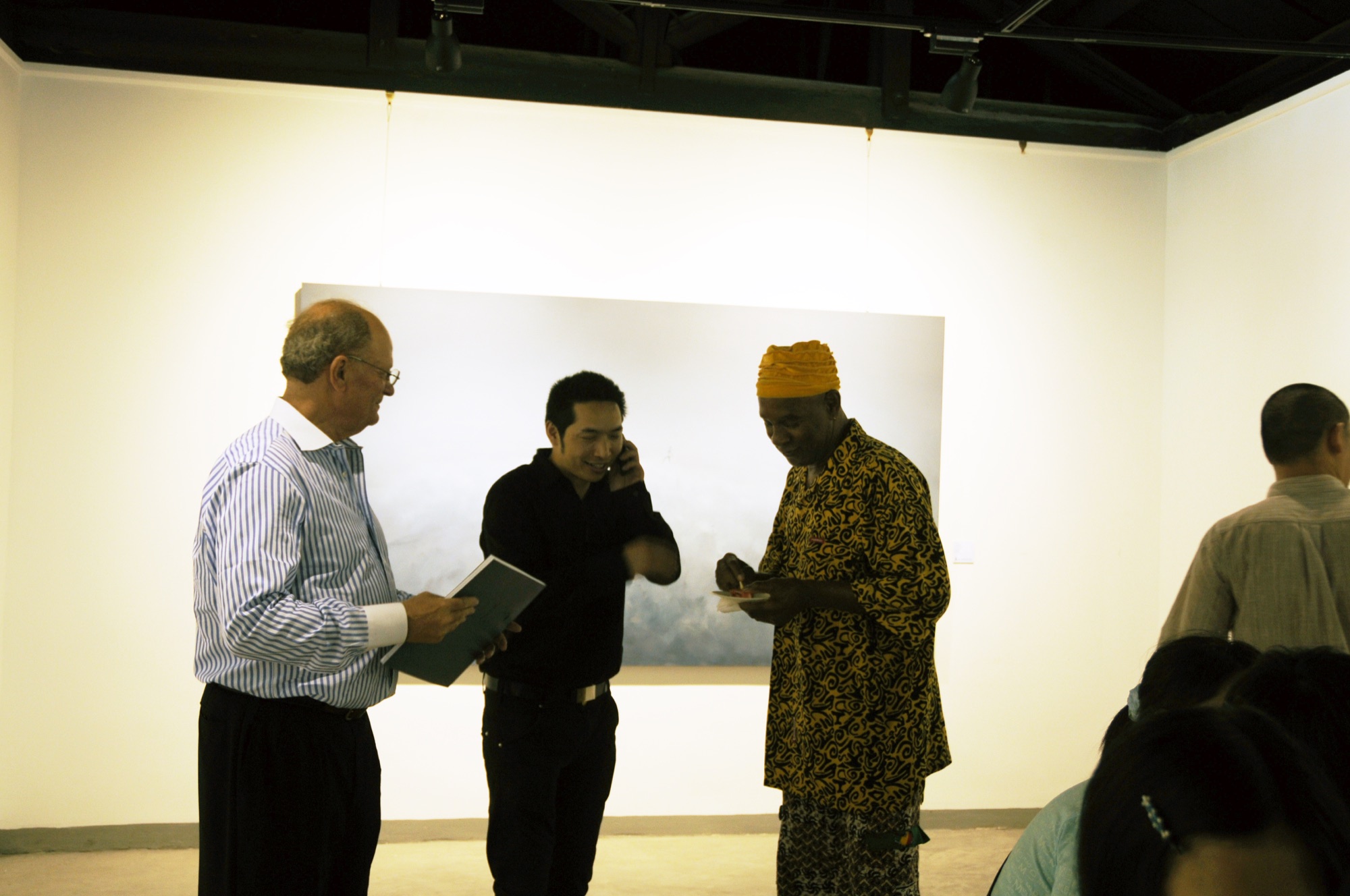 Visitors viewing paintings at A Single Thread.