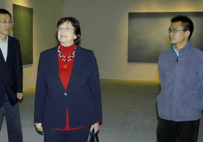 A visitor identified in the supplied filename as Mrs Rogge at Qiming Liu’s exhibition.
