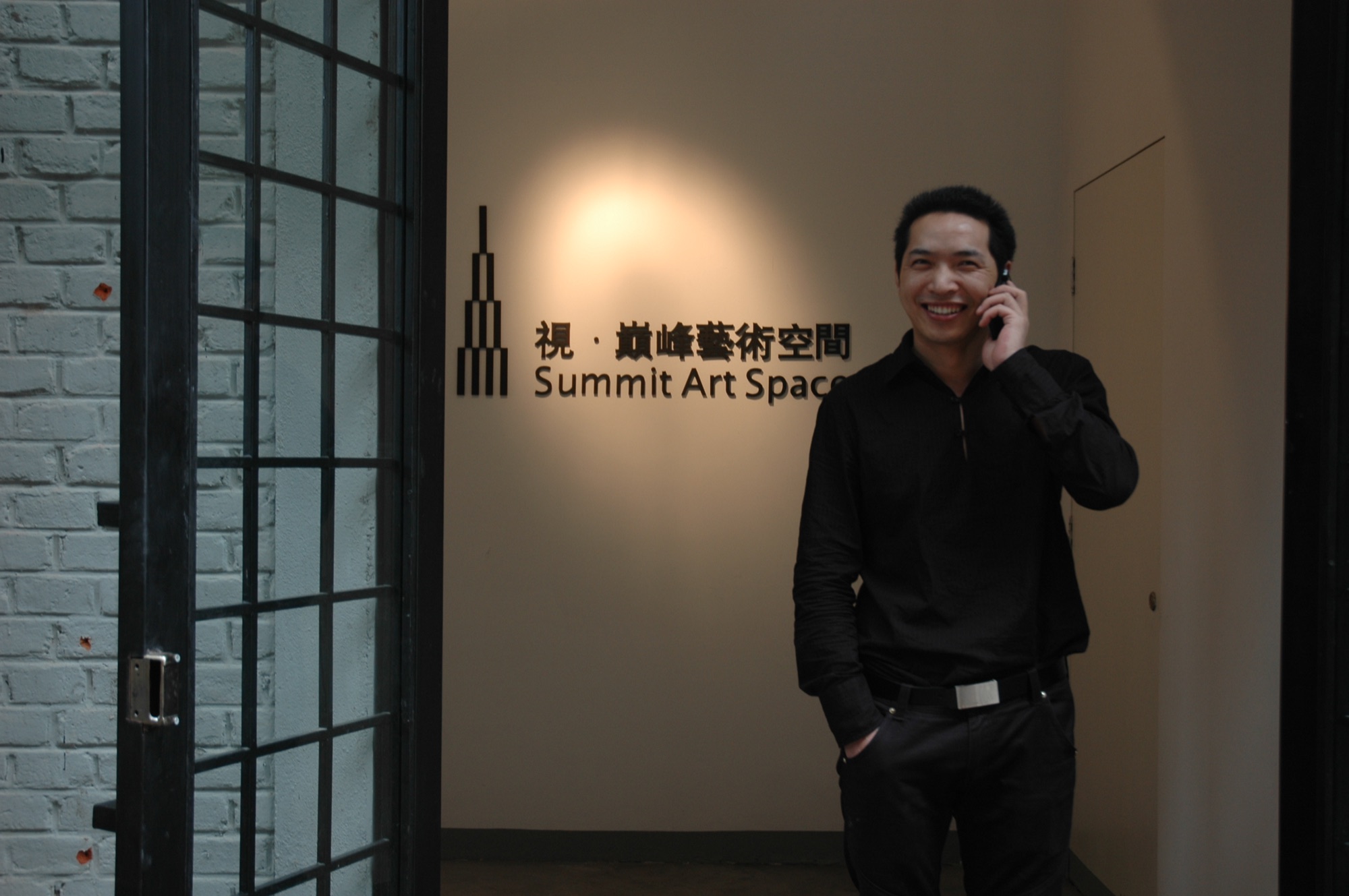 Qiming Liu outside Summit Art Space.