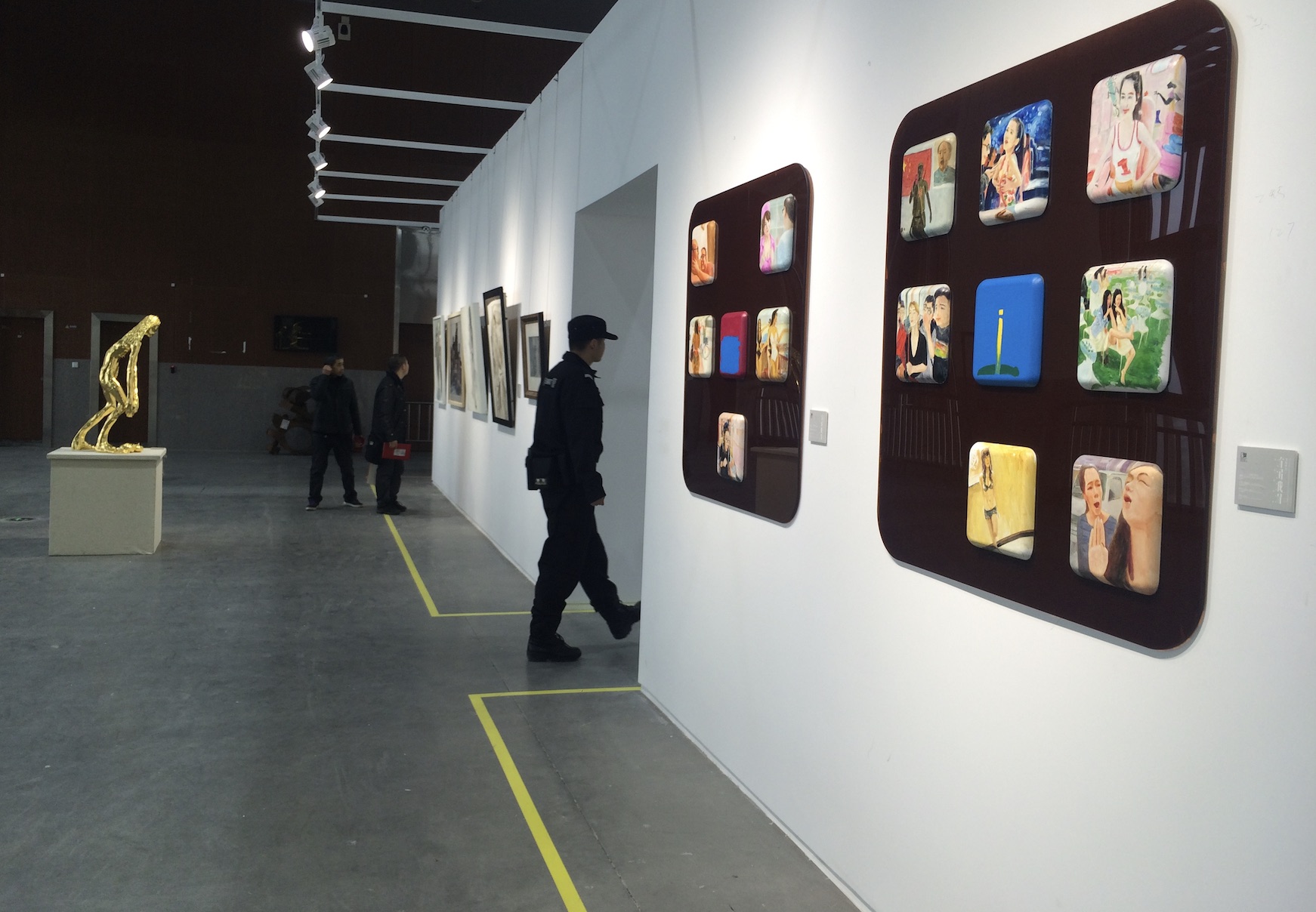 Installation view of paintings from Social Media Circle
